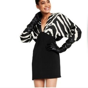 Chic Zebra Print Dress with beautiful Detail on the top portion of the dress.